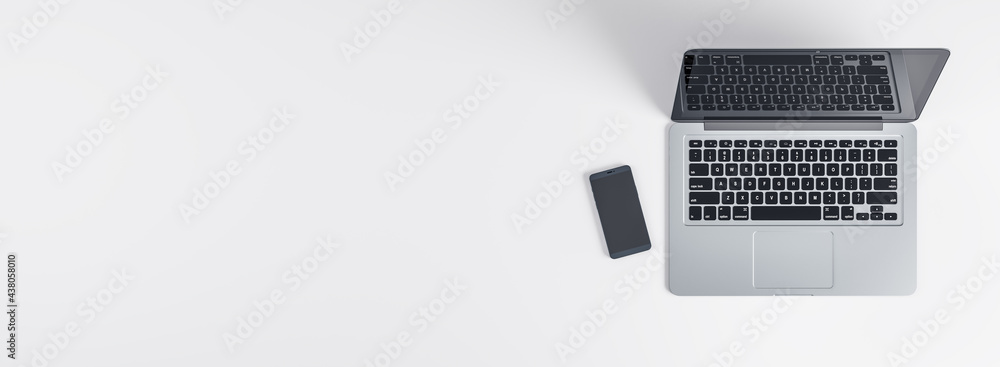 Poster modern grey laptop with black keyboard and smartphone on blank light backdrop. mock up