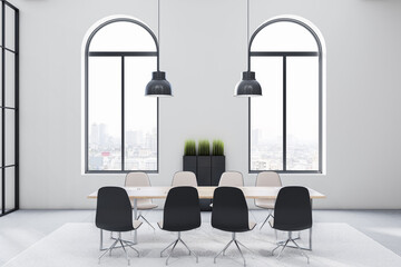 Modern sunny meeting room with city view from arched windows, light wooden conference table and black and white chairs around on light carpet. 3D rendering.