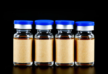 Vaccine medicines on black background
