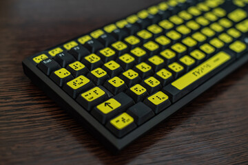 Close-up of a keyboard with the Russian alphabet for the blind. Braille