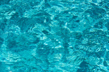 Fototapeta premium Water in swimming pool, background with high resolution. Wave abstract or rippled water texture.