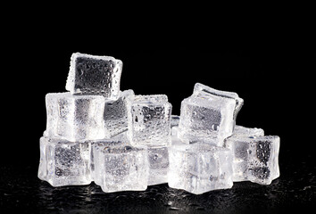 Ice cubes on black background