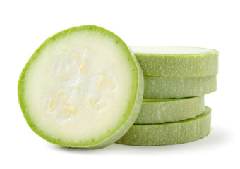 Heap of zucchini cut into pieces on a white plate. Isolated