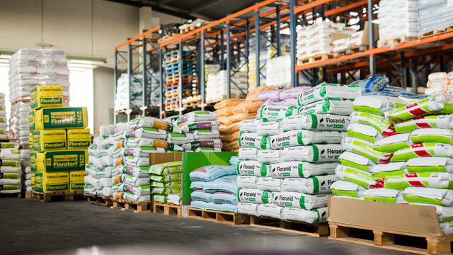 BARCELONA, SPAIN - OCTOBER 9, 2019: Pallets of gardening supplies in plastic bags in hypermarket