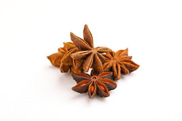 Star anise spice fruits and seeds isolated on white background closeup.