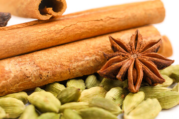 Indian spices and herbs on white background.