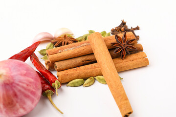 Indian spices and herbs on white background.