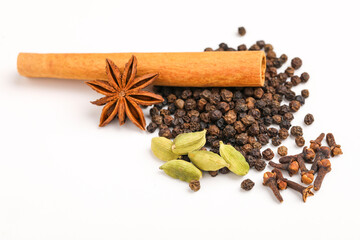 Indian spices and herbs on white background.
