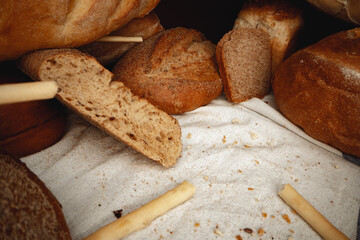 Variety of bread on tablecloth close up