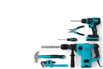 Top view of green construction tools for repair and installation on white