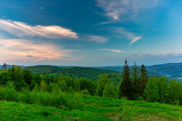 Fototapeta na wymiar Scenery of the Silesian Beskids from Rownica peak at sunrise. Poland