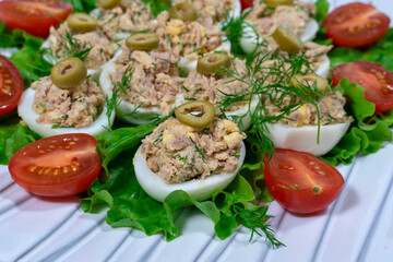 chicken eggs stuffed with tuna and herbs
