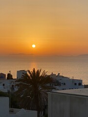 Fototapeta premium sunset on Santorini, view from hotel balcony, Oia sunset
