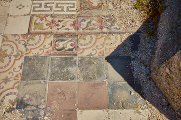 ancient collage of decorated cement tiles of the last century typical of the island of Sicily