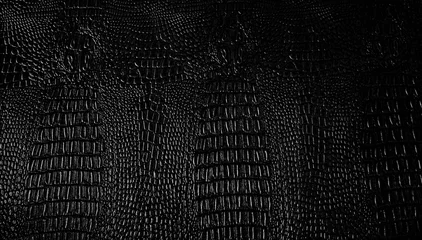 Gartenposter Black crocodile leather texture background © Thasist
