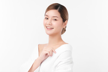 Beautiful young Asian woman wearing bathrobe on white background, Face care, Facial treatment,...