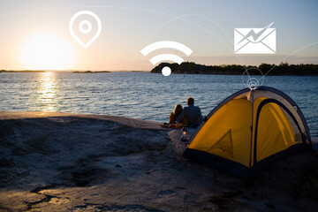 Couple camping at lake and various Internet services icons