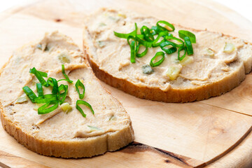 cracklings spread on bread with spring onion