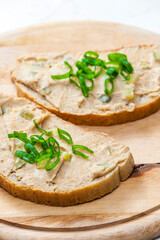 cracklings spread on bread with spring onion