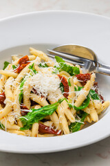 pasta with dry tomatoes and spinach