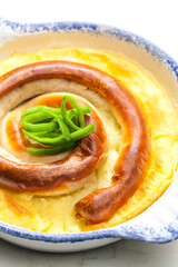 sausage baked with mashed potatoes