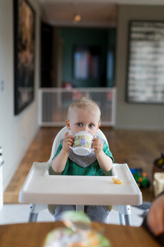 Boy drinking from sippy cup