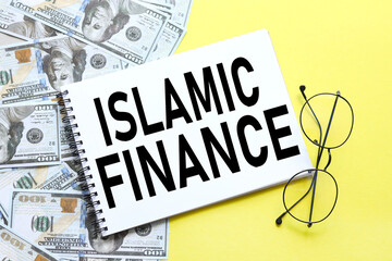 Islamic finance. text on notepad near glasses
