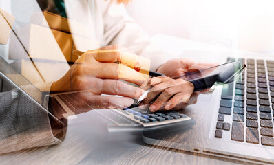 Young woman small business owner online shopping at home. taking note of orders from customers with mobile phones. SME entrepreneur or freelance life style concept.