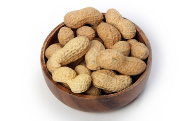 Fresh shelled peanuts in bamboo plate
