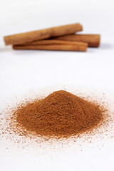 cinnamon sticks on white background....