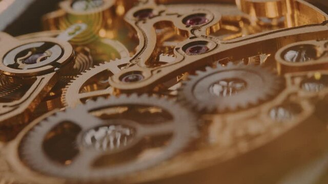 Ancient Golden Cogwheel - Golden Old Clock Mechanism - macro shot