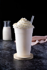 white frappe in a dark background