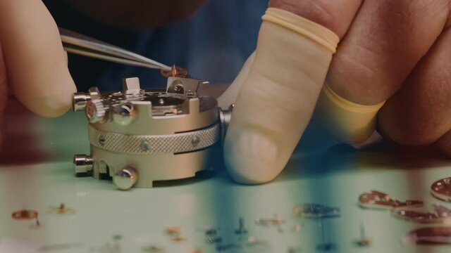 Process Of Installing Parts On A Mechanical Watch - Watch Repair - macro shot