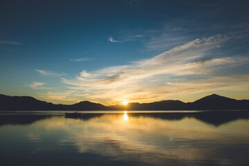 The Morning Sun in Kenepuru Sound, Marlborough Sounds, New Zealand