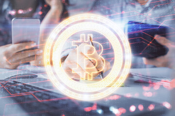 Double exposure of man and woman working together and crypto finance theme hologram. Blockchain business concept. Computer background.