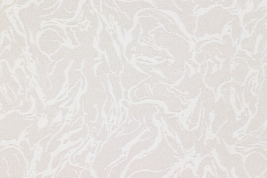 Old, grungy and textured white wallpaper.