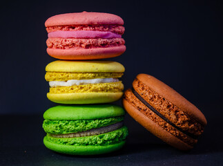 Colorful macarons cakes. Small French cakes. Sweet and colorful french macaroons.