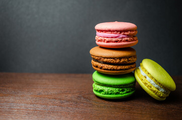 Colorful macarons cakes. Small French cakes. Sweet and colorful french macaroons.