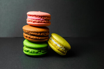 Colorful macarons cakes. Small French cakes. Sweet and colorful french macaroons.