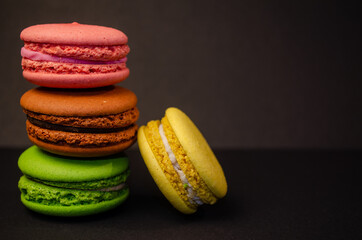 Colorful macarons cakes. Small French cakes. Sweet and colorful french macaroons.