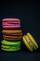 Colorful macarons cakes. Small French cakes. Sweet and colorful french macaroons.