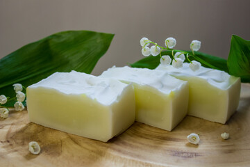 extract of May lily of the valley oil with plant and flower. Natural soap from scratch, handmade.