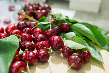 still life of cherries on a table in the yard