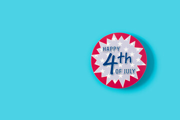 Happy 4th July ornament on blue background. Copy space