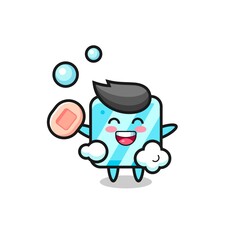 ice cube character is bathing while holding soap
