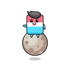 illustration of eraser cartoon sitting on the moon