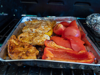 grilled meat and fish with vegetables