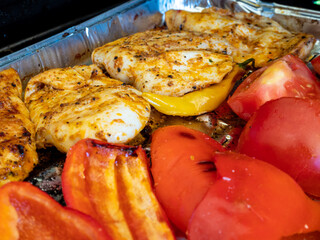 grilled meat and fish with vegetables