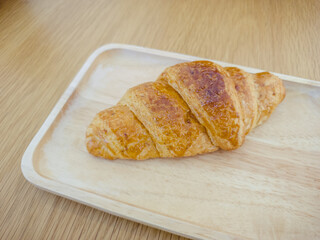 croissants on wooden table.