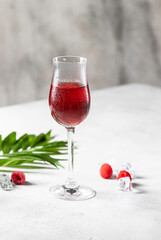 Berry alcoholic cocktail liqueur, vodka, ice and mint. Refreshing cool drink, berry liqueur or red alcoholic cocktail.